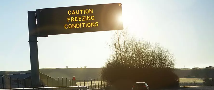 sign on motorway warning for freezing conditions